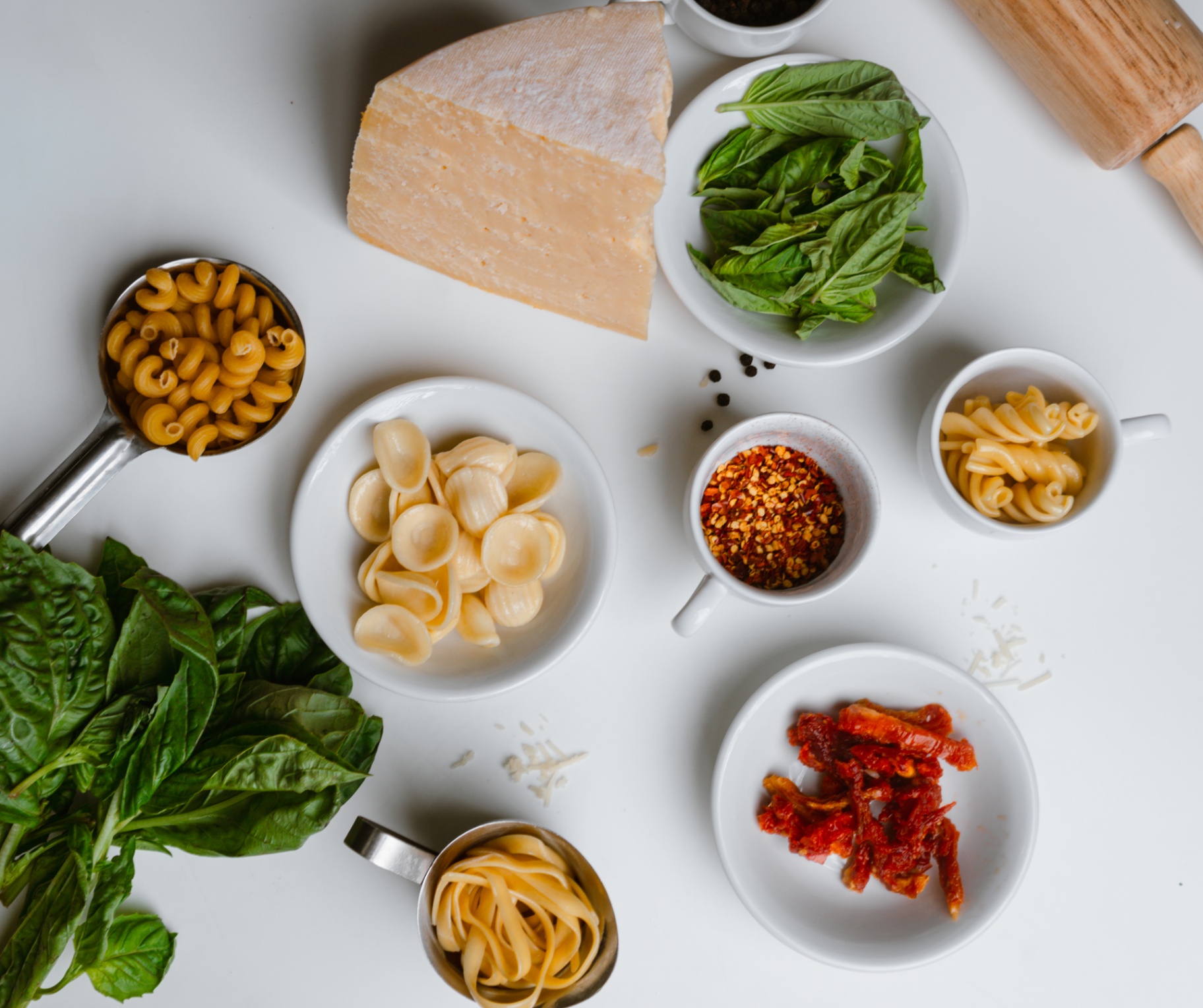 Fresh pasta shapes, basil, parmesan and chili flakes
